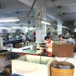 Workers in a hand bag factory