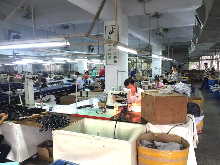 Workers in a hand bag factory