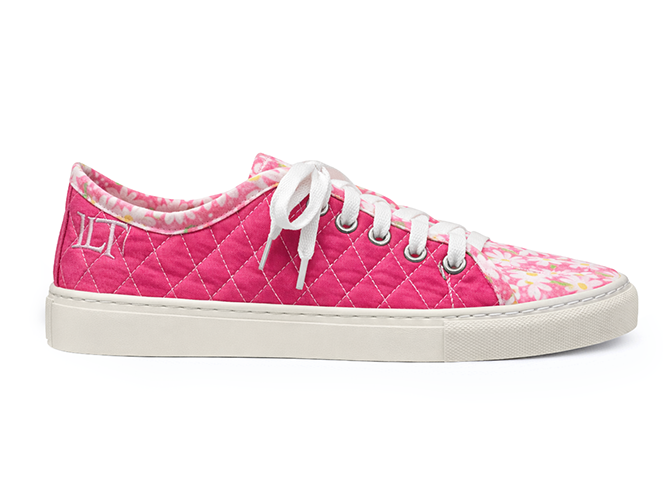 Hot Pink Quilted Floral Sneaker Hot pink quilted low-top sneaker with floral toe print, white laces, and white sole