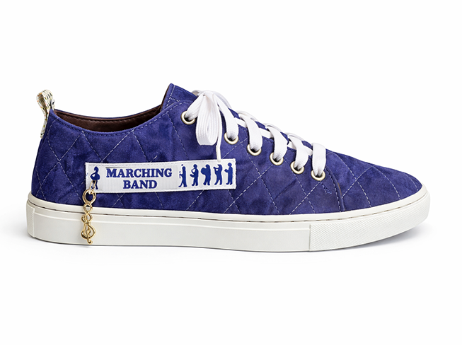 Purple Marching Band Quilted Sneaker Purple quilted low-top sneaker with white laces, marching band patch, and white sole