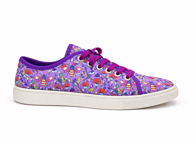 Purple low-top sneaker with bee and floral print, purple laces, and white sole