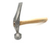 Close-up of a hammer head with a wooden handle. The hammer head is stamped with the text "C.S. OSBORNE & CO 65 MADE IN USA FORGED STEEL". The hammer is made of metal and wood.