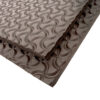 Macro close-up shot focusing on the high-traction anti-slip dog bone textured pattern of the high-density EVA shoe repair sheet.