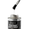 Close-up of a brush lifting clear adhesive from an open 4 oz can of Angelus Clear Shoe Cement, showing the adhesive's consistency.