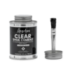 Angelus Clear Shoe Cement 4 oz metal can displayed beside its removable cap with attached adhesive application brush.